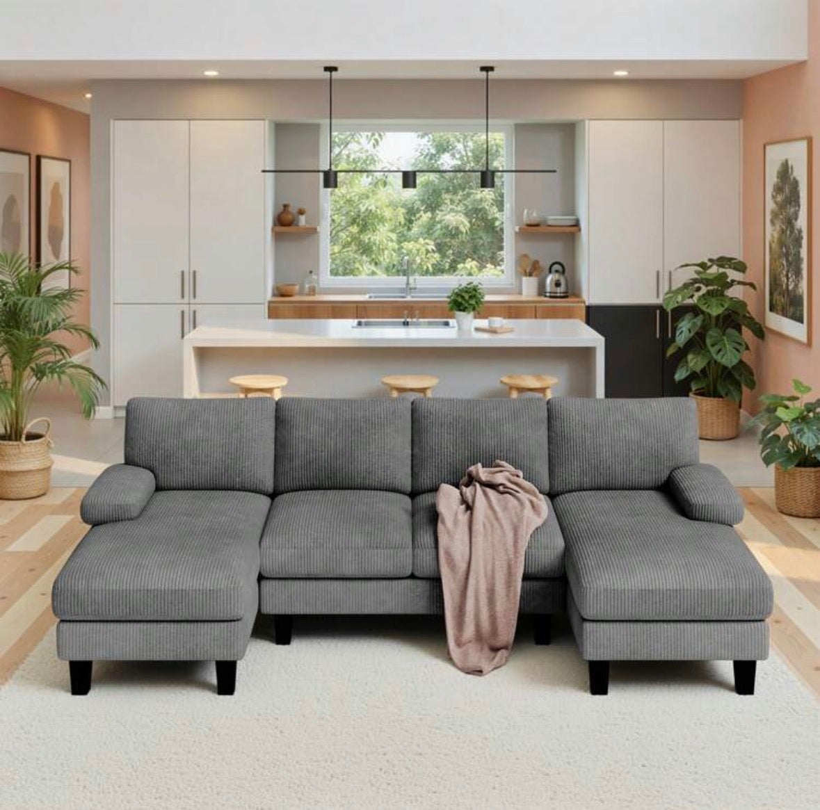 U-shaped sofa with corduroy upholstery.