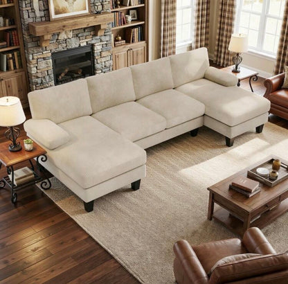 U-shaped sofa with corduroy upholstery.
