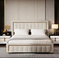 Upholstered storage bed with gilded trim