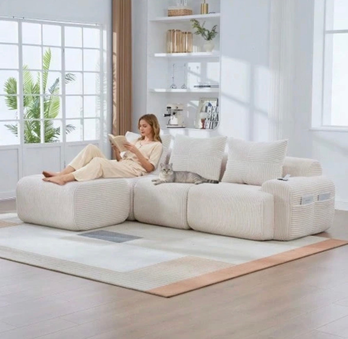 Beige sofa with cushions included