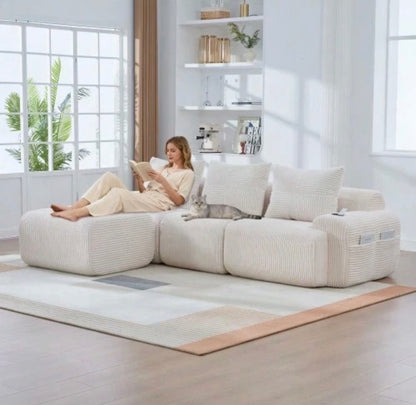 Beige sofa with cushions included