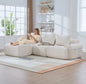 Beige sofa with cushions included